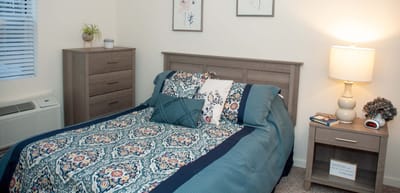 Cozy private room with a bed and decor