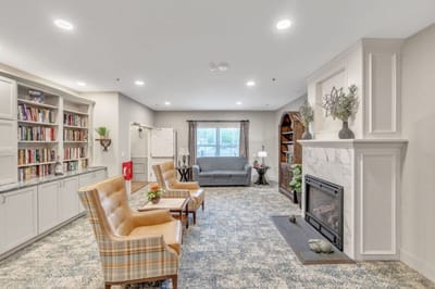 Interior common area with seating and bookshelves
