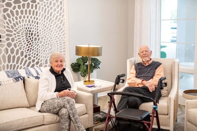 Two residents relaxing in a common area