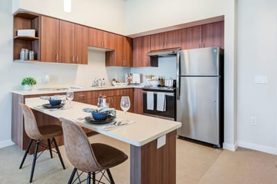 Modern kitchen interior with dining setup