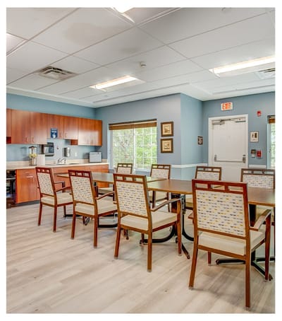 Bright common area with tables and chairs