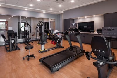 Interior view of a fitness area with exercise equipment