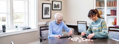 Residents engaging in an activity in a common area