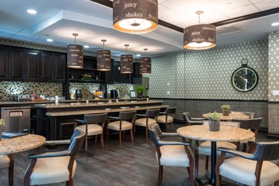 Bright dining area with modern furnishings and decor