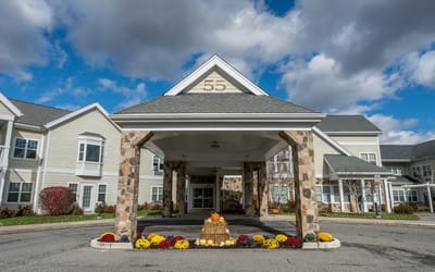 Front entrance of The Knolls facility with fall decorations