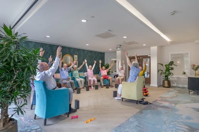 Residents participating in a group exercise class