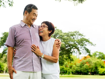 Couple enjoying a joyful moment in a park