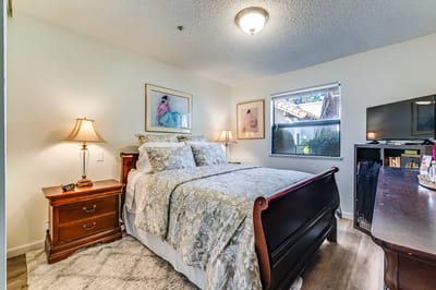 Cozy resident room with a bed and decor