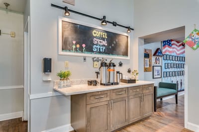 Interior coffee station with chalkboard art and decor