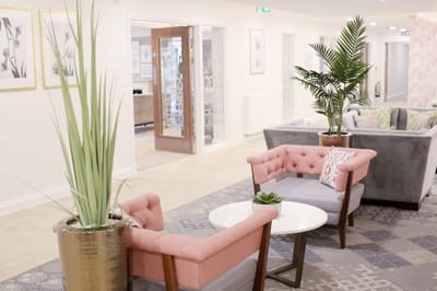 Indoor common area with stylish seating and plants