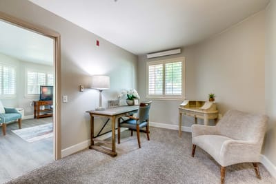 Cozy resident room with modern decor and furnishings