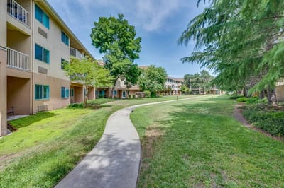 Pathway through landscaped gardens at the facility