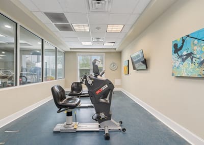 Interior view of a fitness area with exercise equipment