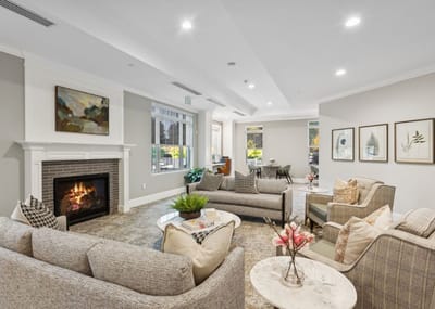 Interior common area with comfortable seating and a fireplace