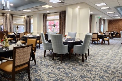 Dining area with neatly arranged tables and chairs