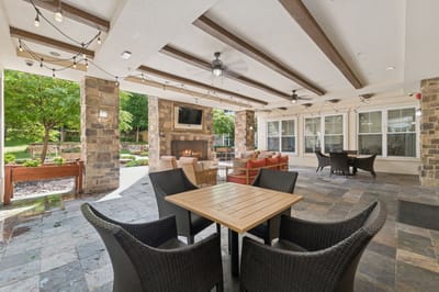 Outdoor common area with seating and greenery