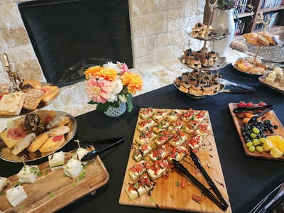 A beautifully arranged dining table with assorted food items