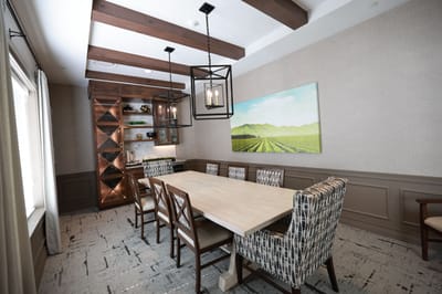 Interior dining area with a large table and chairs