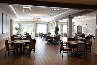 Bright dining room with tables and chairs