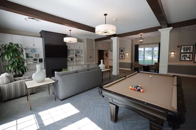 Interior view of a common area with a pool table
