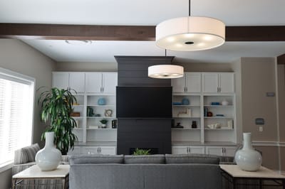 Common area with seating and decorative shelves