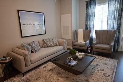 Stylish living room area with a cozy sofa and artwork