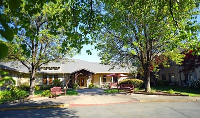 Exterior view of Oakdale Heights with seating area