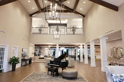 Interior view of a spacious lobby with a piano