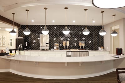 Interior view of a stylish common area with a counter