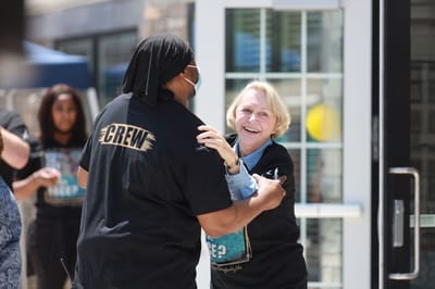 Staff interacting with a resident during an event