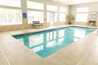 Indoor swimming pool area in a senior living facility