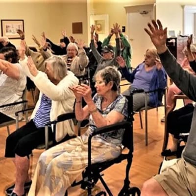 Residents participating in a lively group activity
