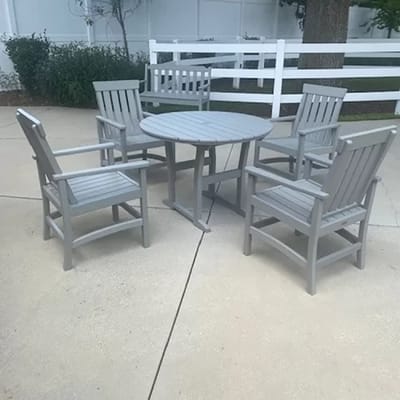 Outdoor seating area with a table and chairs