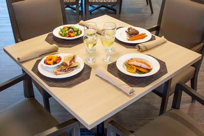 Dining table set with gourmet meal options