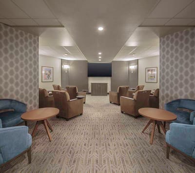 Indoor common area with seating and tables