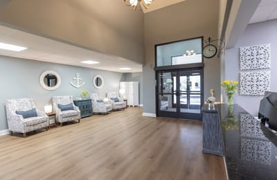 Bright lobby area with seating and decor
