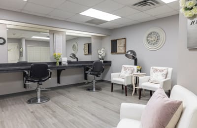 Facility interior salon with seating and decor
