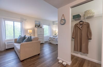 Cozy resident room with a couch and closet