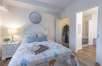 Cozy resident room with bed and bathroom