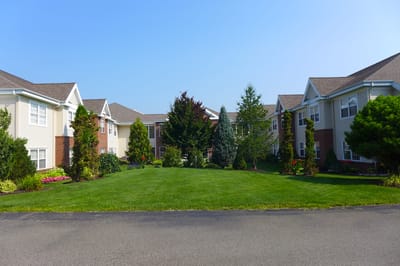 Well-maintained outdoor area with landscaped gardens