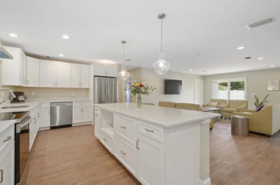 Bright and modern common area with a kitchen