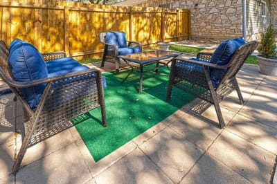 Outdoor seating area with chairs and a table