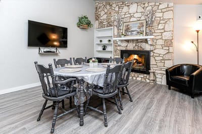 Dining room with a table and fireplace
