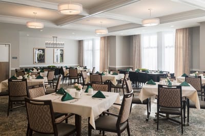 Bright dining room with neatly set tables