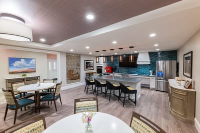 Bright common area with kitchen and dining space