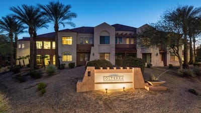 Exterior view of Solterra Senior Living at Chandler during twilight