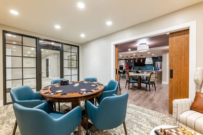 Interior view of a game room with a poker table