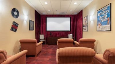 Cozy private screening room with comfortable seating