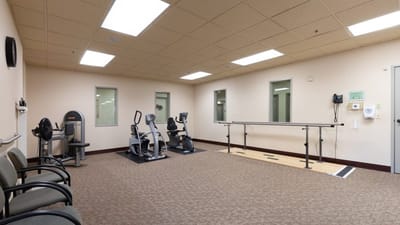 Interior view of a fitness area with equipment