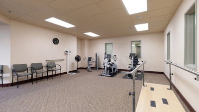 A bright fitness area with exercise equipment
